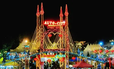 a carnival with a sign in the middle of it at •Lovely Home•11Pax+4Bedrooms+Themed•Bukit Mertajam in Bukit Mertajam