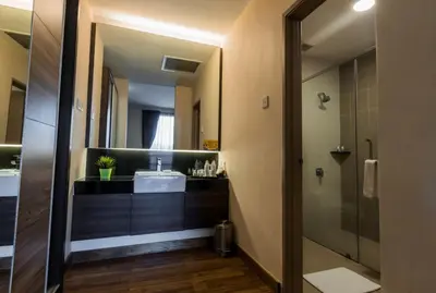 a bathroom with a sink and a mirror at Sunway Lost World Hotel in Ipoh