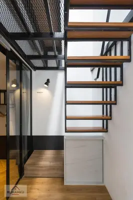 a staircase in a room with a white wall at RumahKu Georgetown in George Town