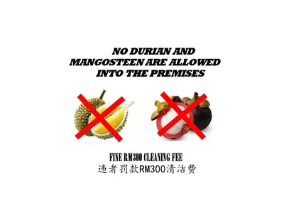 no durian and margarita are allowed into the premises poster at RumahKu Georgetown in George Town