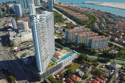 an aerial view of a tall building in a city at The Landmark by Katana in George Town