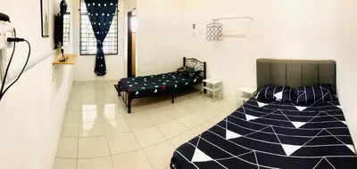 a bedroom with a bed and a basketball hoop at Homestay Lestary near Taiping Fast WIFI Netflix in Taiping