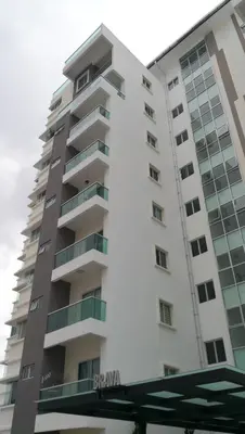 a tall white apartment building with balconies at My Home Apartment - The Quintet Condo in Cameron Highlands