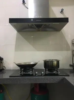 two pots on top of a stove in a kitchen at W21 atGoldenHills NightMarket WiFi 4R in Cameron Highlands