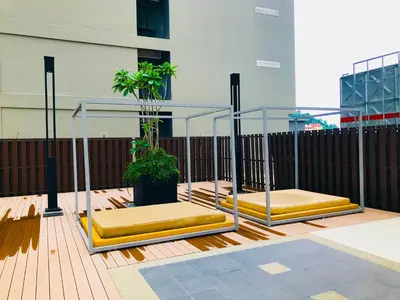 two beds in a glass enclosure on a deck at Luxury Seaview Family Suite by Little Cabin in George Town