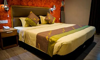 a hotel room with a large bed in a room at K GARDEN HOTEL (IPOH) SDN BHD in Ipoh