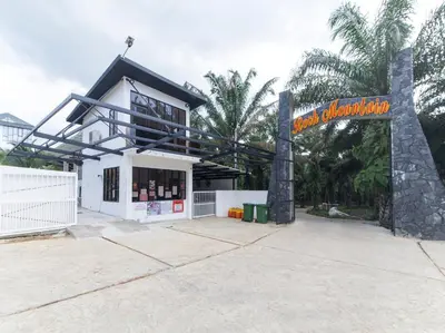 a building with a sign in front of it at Rock Mountain in Raub
