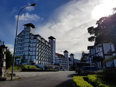 a building with a street light on the side of a road at Gerard's 