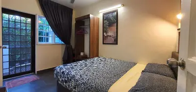 a bedroom with a bed and a window at Gerard's 