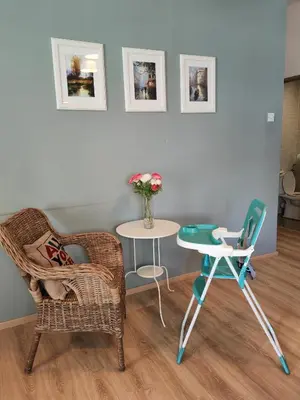 a room with two chairs and a table and a table at The Quintet, Tower Ethel in Tanah Rata