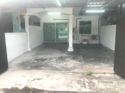 an empty room with columns in a garage at Seri Manjung Homestay Wazer Residence in Lumut