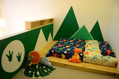 a childs bedroom with a bed and toys in it at The Woodz Thematic Homestay - Cameron Highlands Golden Hills Night Market in Cameron Highlands