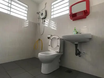 a bathroom with a toilet and a sink at beXuan-Private Pool-Town Area-Snooker-BBQ-12-18Pax in Ipoh