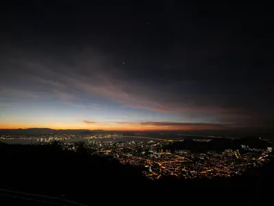 a view of a city from a hill at night at Hickory Penang Hill in George Town