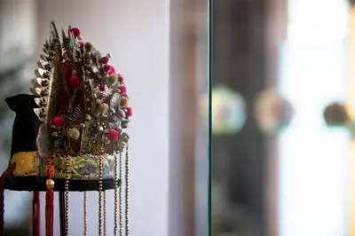a golden crown on top of a glass window at Seven Terraces in George Town