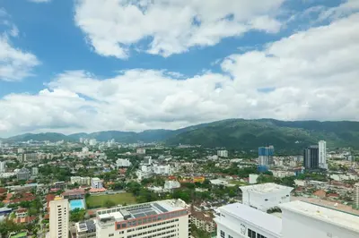 a view of a city with mountains in the background at The Millen Penang, Autograph Collection in George Town