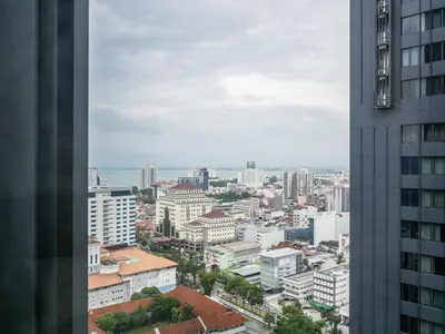 a view of a city from a tall building at Casita 22, 218 Macalister Georgetown City & Seaview in George Town