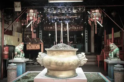 a large vase sitting in front of a building at 8 Boutique By The Sea in George Town