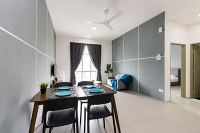 a dining room with a table and chairs at DreamScape Studio @ Golden Hill Cameron in Cameron Highlands