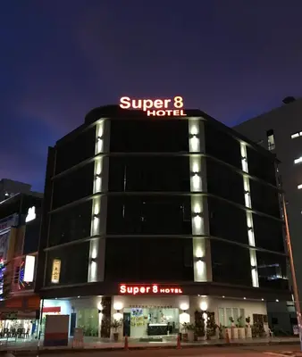 a building with a super hotel sign on it at Super 8 Hotel @ Bayan Baru in Bayan Lepas