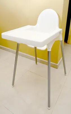 a white table with metal legs in a room at Decozy 3.0 Semi-D in Ipoh