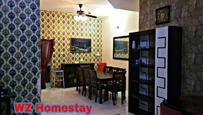 a dining room with a table and chairs at Double Storey @ Tapah in Tapah