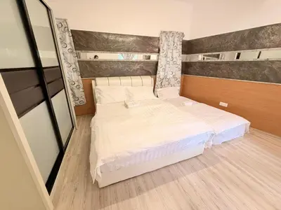 a small bedroom with a white bed in it at The Haven Retreat B7-2-1 ( Silverpark) in Bukit Fraser