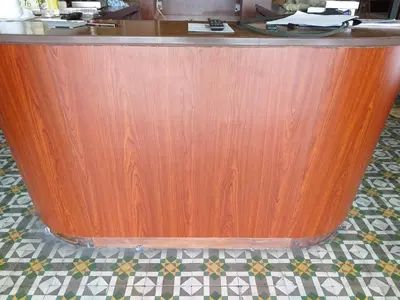 a wooden bar with a wooden counter top at Hotel Peking in Taiping