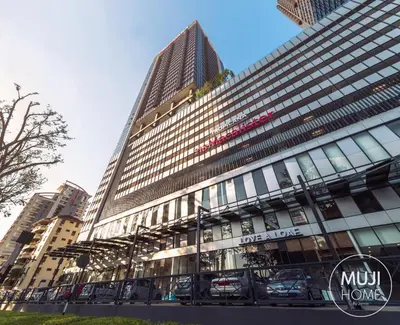 a tall building with cars parked in front of it at Muji Studio 1 - Seaview at 218 Tropicana Near Komtar Food Heaven with Netflix & TV Box in George Town