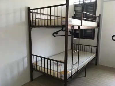 a set of bunk beds in a room at Homey Hostel, Ipoh Town in Ipoh