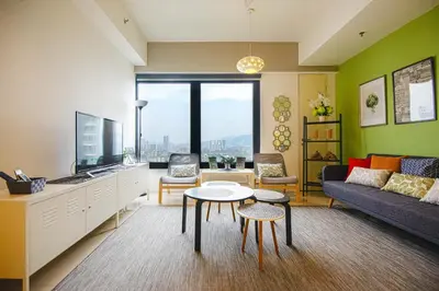 a living room with a couch and a table at Casa Orient @ Macalister 218 ❈中路218东方之家 3BR 8PAX in George Town