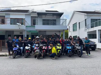 a group of people posing for a picture with their motorcycles at WeJDAN INN BALIK PULAU, PENANG ISLAND in Balik Pulau
