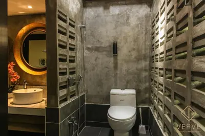a bathroom with a toilet and a sink and a mirror at L&P Boutique Residence by Verve (14 Pax) EECH40 in Ipoh