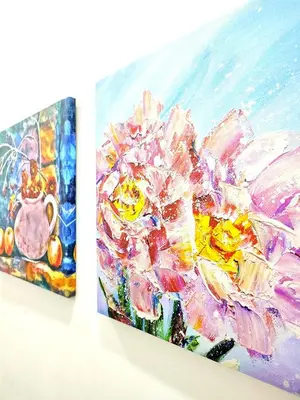 a painting of a vase with flowers at Rara Homestay Kuala Kangsar in Kuala Kangsar