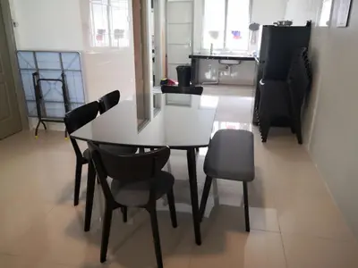 a white table and chairs in a room at My Homestay N18 (14 pax) @ Golden Hills Night Market in Brinchang