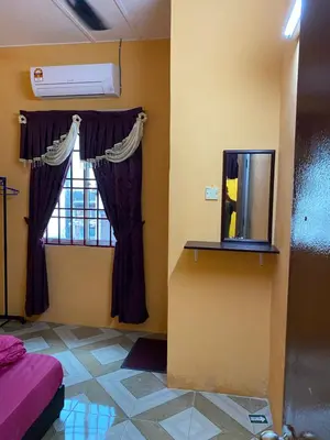 a room with a window and a mirror at PJM HILL VIEW HOMESTAY in Ipoh