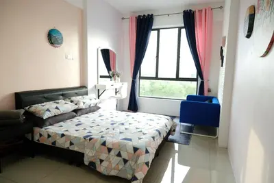 a small bedroom with a bed and a window at Haaniy Homestay Casa Kayangan Meru in Ipoh