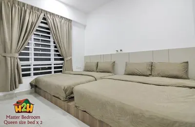 a bedroom with two beds and a window at H2H - Neo Casual - Majestic Ipoh Town Center - 8pax in Ipoh