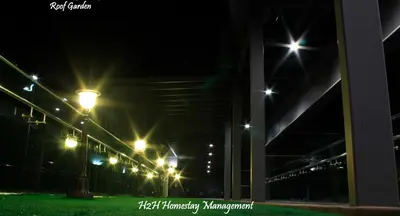 a row of street lights at night at H2H - Botanical Majestic Ipoh in Ipoh