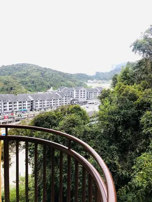 a balcony with a view of a street and buildings at 3 Rooms Apt @ Crown Imperial Court in Cameron Highlands