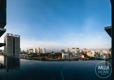 a view of a city skyline from a swimming pool at MUJI Studio 2 - Seaview at 218 Tropicana Near Komtar Food Heaven with Netflix & TV Box in George Town