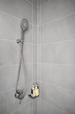 a shower with a shower head in a bathroom at MUJI Studio 2 - Seaview at 218 Tropicana Near Komtar Food Heaven with Netflix & TV Box in George Town