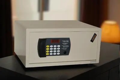 a microwave oven sitting on top of a table at ERNES Hotel in Perai