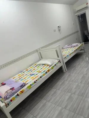 two bunk beds in a room with at 15 min to Qing Xin Ling Cultural Village Ipoh in Ipoh