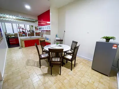 a dining room with a table and chairs in a kitchen at Gather Here 62 5BR Town Center 5 Rooms in Taiping