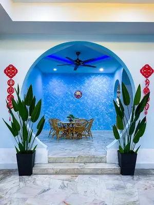 a dining room with a table and a ceiling fan at Gather Here 62 5BR Town Center 5 Rooms in Taiping