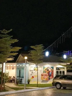 a car parked in front of a building at night at Kingston Hotel 13 - Penang Hills formerly known as Deview Hotel in Ayer Itam