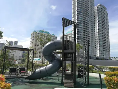 a playground with a slide in a city at Landmark Lovely Coast View King Suite#500mbpsWifi#Netflix in Tanjong Tokong
