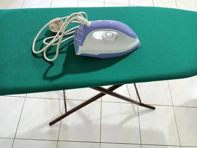 a blue and white computer mouse sitting on a green table at Pangkor Coral Bay Resort(3 bedrooms) \u4f11\u606f\u5c0f\u7ad9 in Pangkor