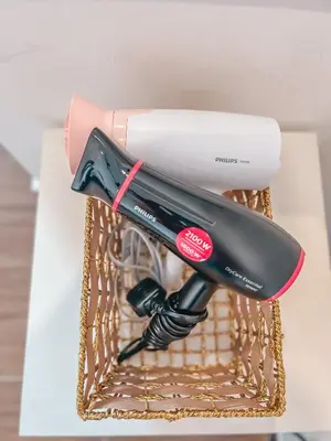 a hair dryer in a basket on a table at Golden Sweet Home @ Golden Hills (Night Market, \u591c\u5e02) in Tanah Rata